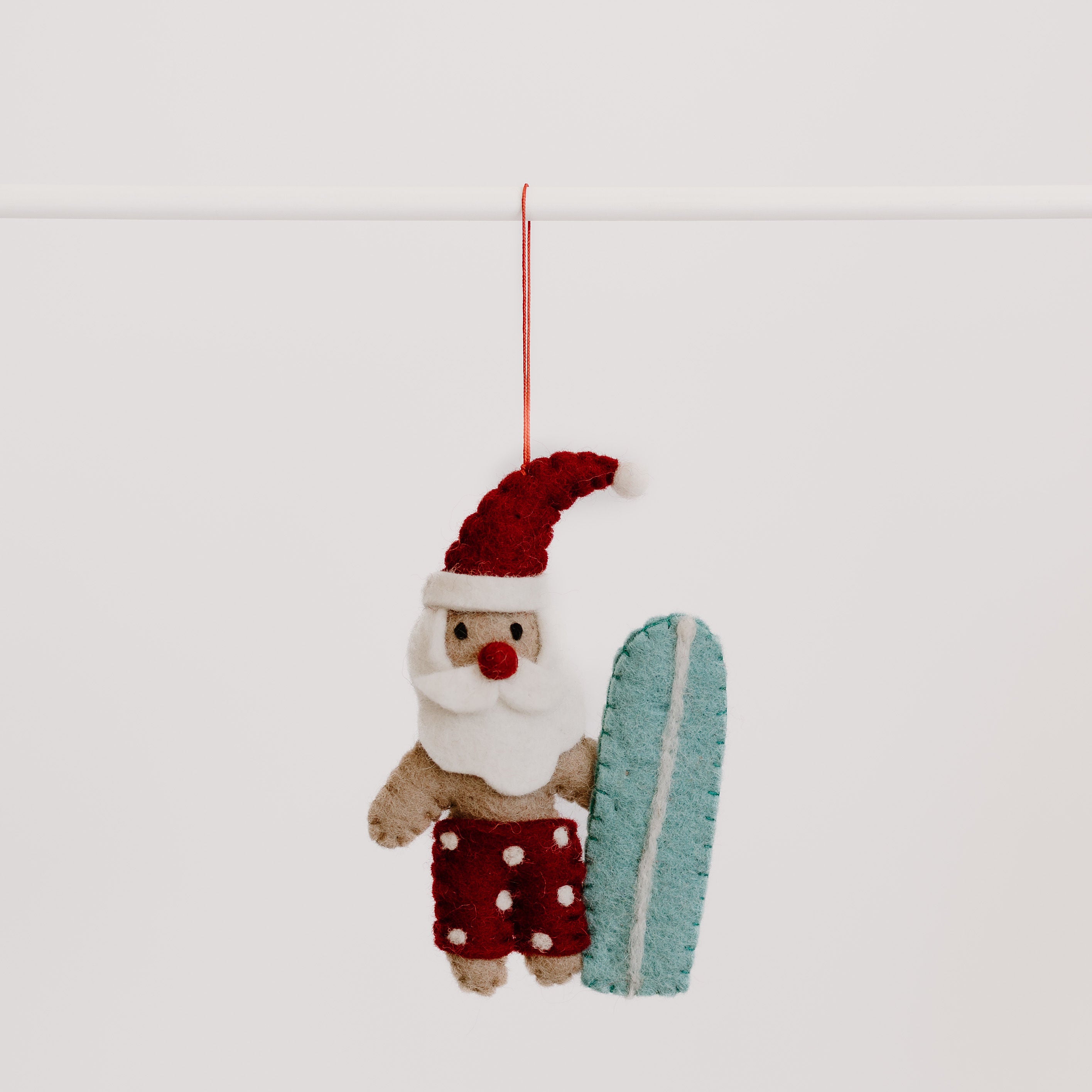 Pashom | Hanging Decoration - Santa w/ Blue Surfboard