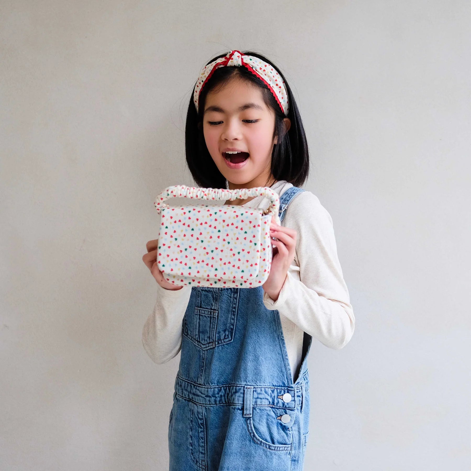 Mimi & Lula | Heart Print Top Handle Bag