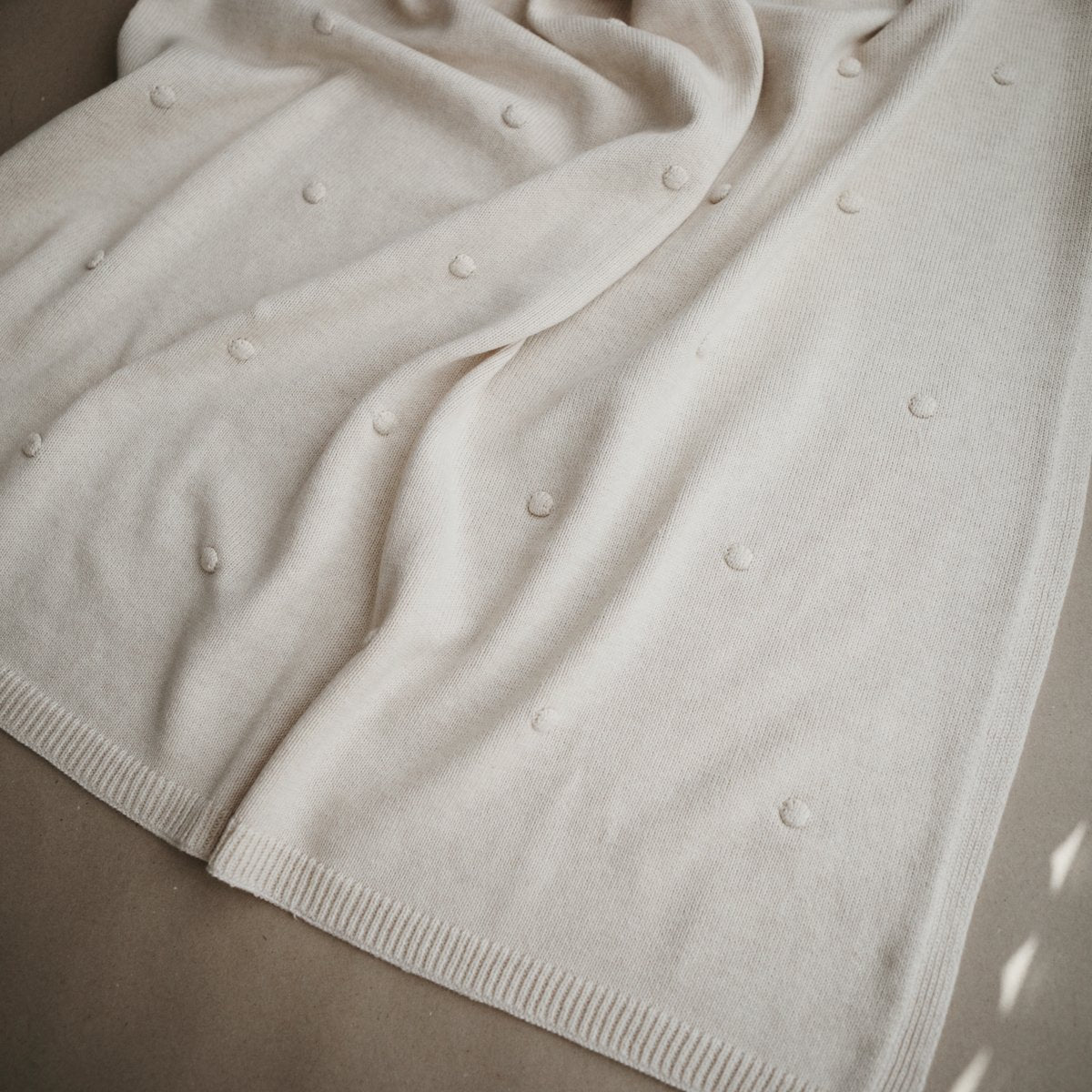 Mushie | Knitted Textured Dots Baby Blanket - Off White Melange