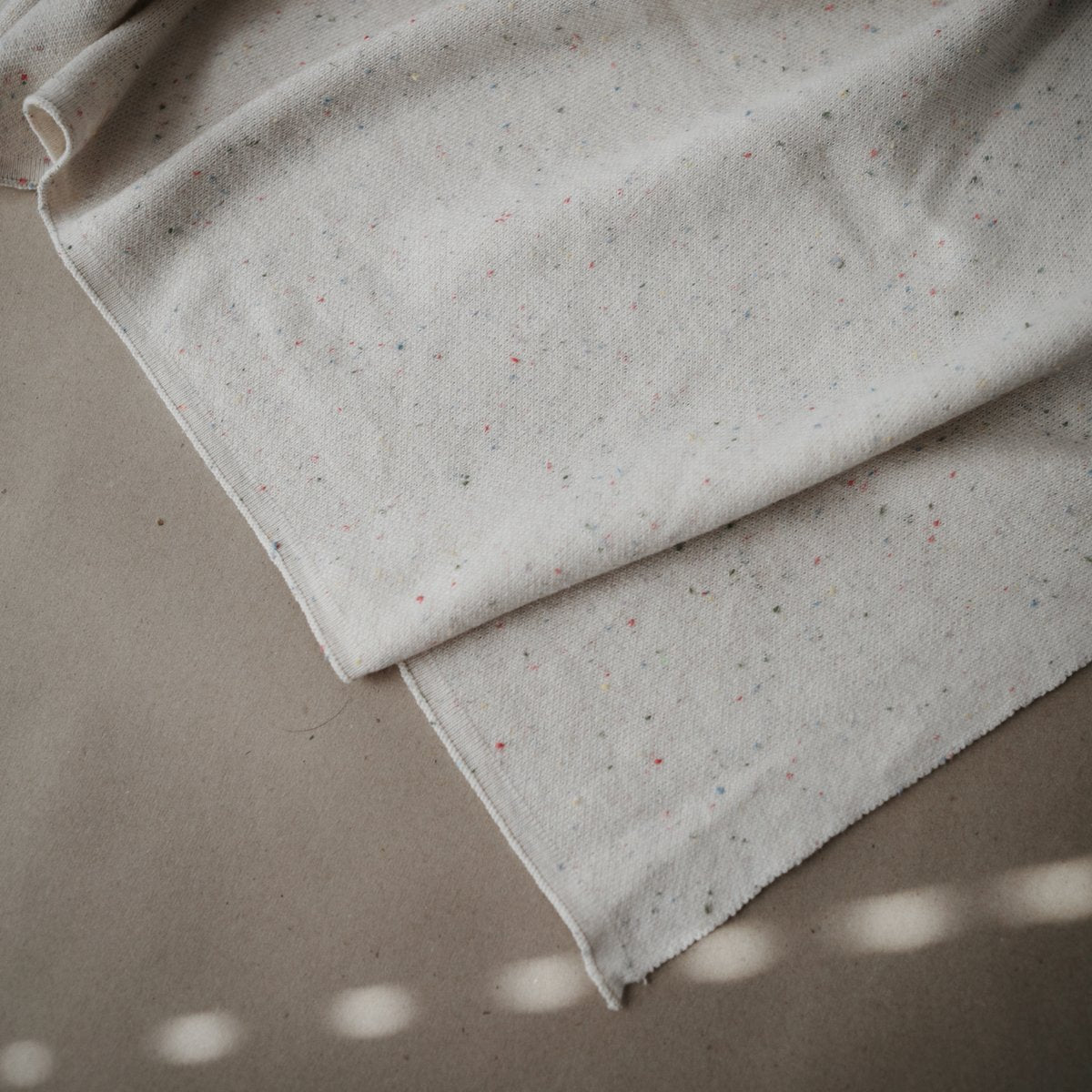 Mushie | Knitted Confetti Baby Blanket - Ivory